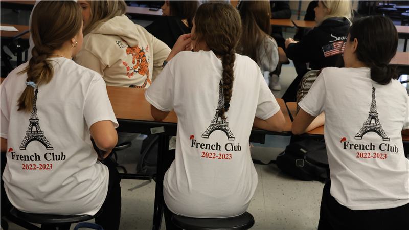 Photo of 3 Susquehannock girls wearing shirts with the Eiffel Tower and "French Club 2022-23" 
